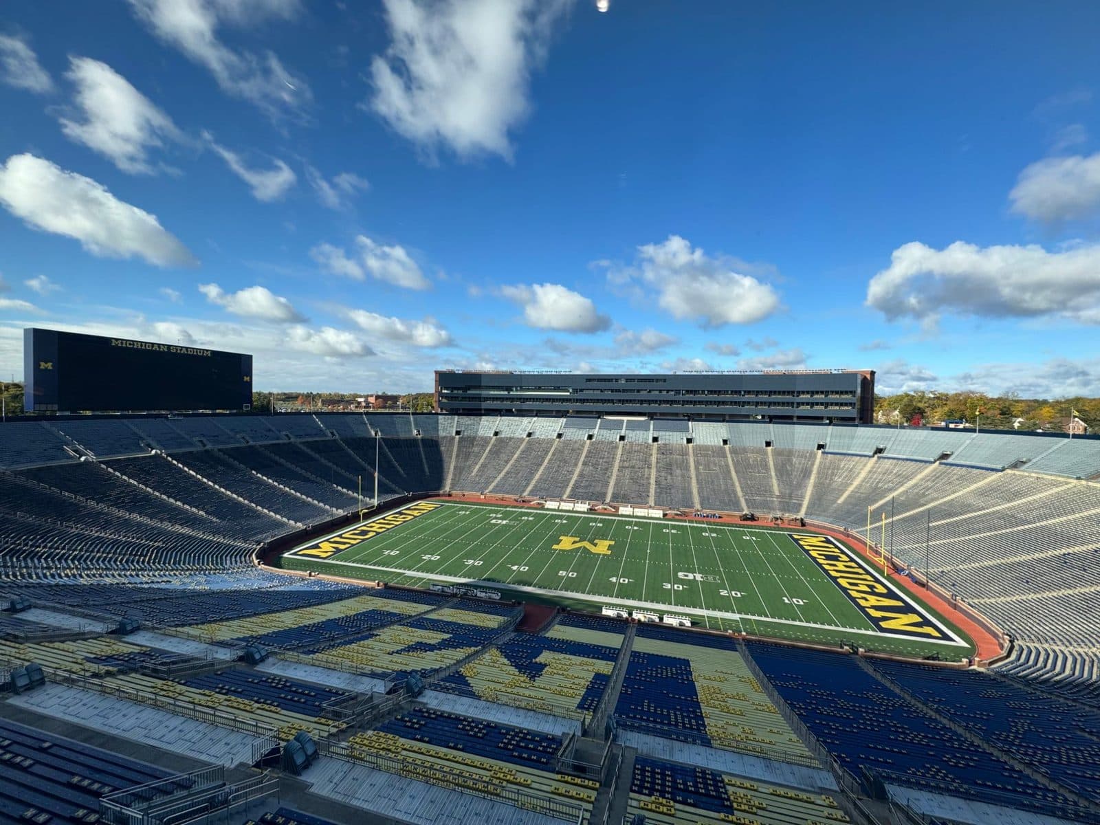 Michigan Stadium from the upper deck under a blue sky